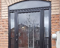 Black porch with an arch