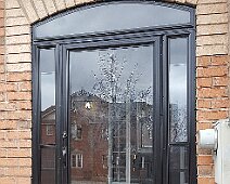 Black porch with an arch